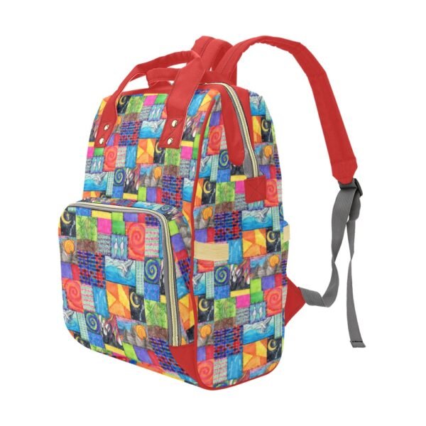 Multi-function backpack featuring an eye-catching patchwork design with swirls, geometric shapes, an art piece inspired by the creation story, including birds and leaves. The vibrant mix of red, blue, green, yellow, and purple creates a bold statement, complemented by sturdy red handles, metal rivets, and a front zippered pocket for convenience. Adjustable Red shoulder straps enhance versatility, making this original Imaginables creation a blend of artistic expression and everyday functionality