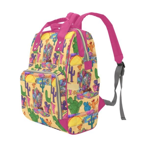 Texas sunset multi-function travel backpack featuring vibrant pink straps and handles, adorned with a colorful design of cowboy boots, cacti, and sunsets against a warm yellow background Inspired by Texas. The spacious main compartment, front zippered pocket, and adjustable shoulder straps offer both style and practicality. An original Imaginables creation blending Western charm with artistic expression, 32oz waterbottle pocket.